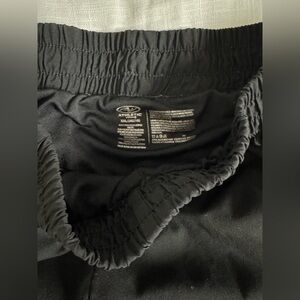 workout shorts, have a thick waistband, tight shorts underneath.